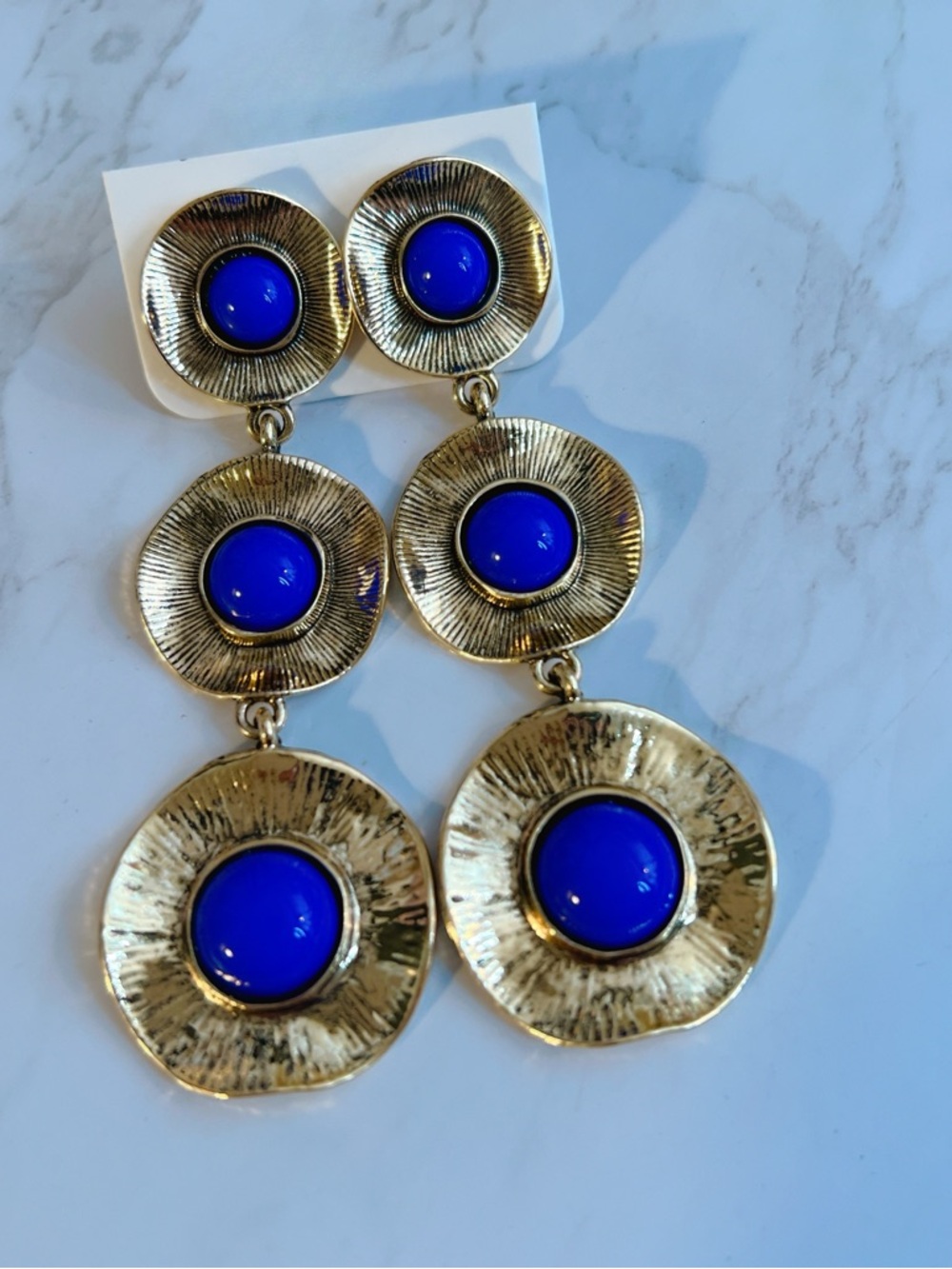 Gold plated cobalt blue hammered 3” earrings round graduated